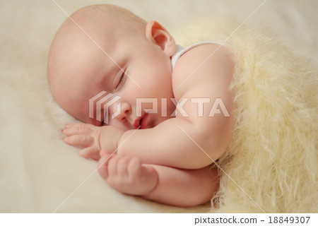 Little baby on the bed at home Little baby on the bed at home 18849307