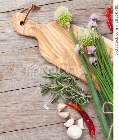 Fresh herbs and spices on garden table 18850780