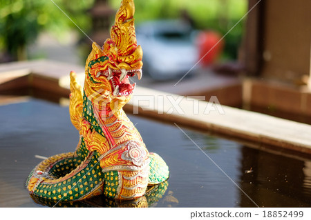 Naga statue rising on the pool Naga statue rising on the pool 18852499