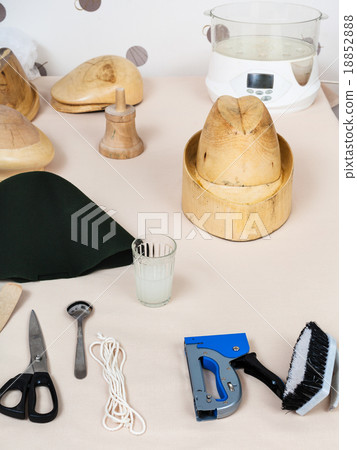 tools and equipment for hatmaking on table 18852888