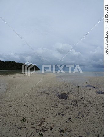 The sandy beaches of Palau and Karp Island and the rain clouds falling in the distance The sandy beaches of Palau and Karp Island and the rain clouds falling in the distance 18853321