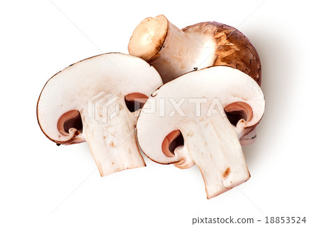 Whole and two half brown champignons 18853524