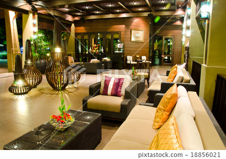Spacious living room is decorated with soft lights 18856021