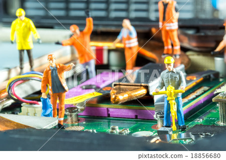Team of engineers repairing circuit mother board.  18856680