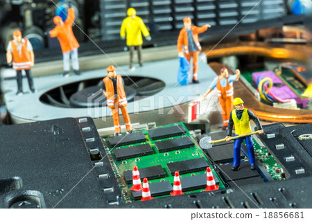 Team of engineers repairing circuit mother board.  18856681