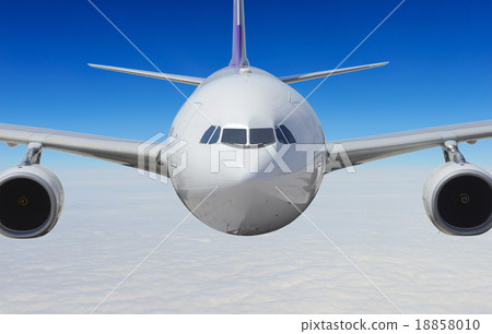 Commercial airplane above the clouds Commercial airplane above the clouds 18858010