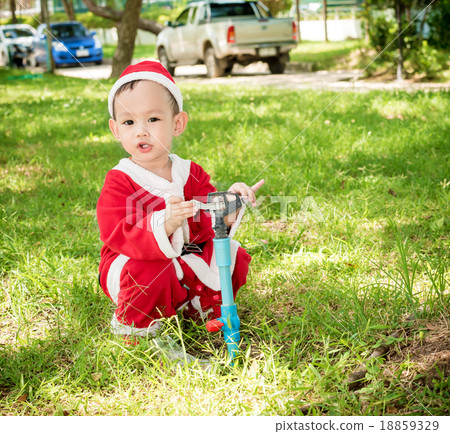 Asian baby boy in santa claus suit Asian baby boy in santa claus suit 18859329