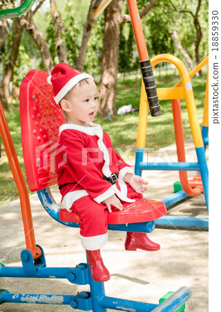 Asian baby boy in santa claus suit Asian baby boy in santa claus suit 18859330