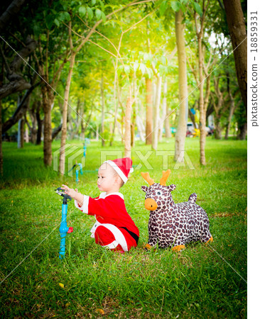 Asian baby boy in santa claus suit Asian baby boy in santa claus suit 18859331