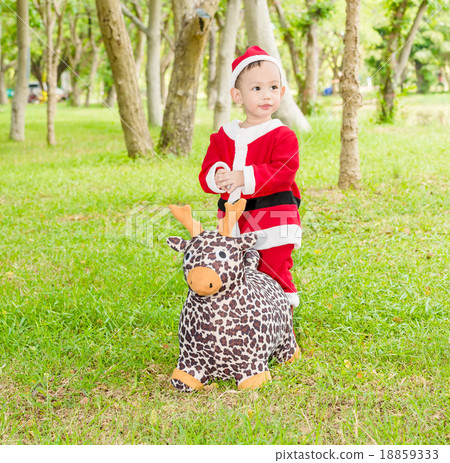 Asian baby boy in santa claus suit Asian baby boy in santa claus suit 18859333