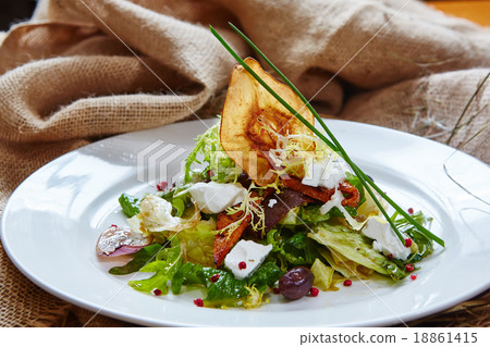 Fresh spring salad with feta cheese, red onion in 18861415
