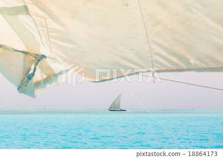 Traditional wooden sailboat sailing on horizon. Traditional wooden sailboat sailing on horizon. 18864173
