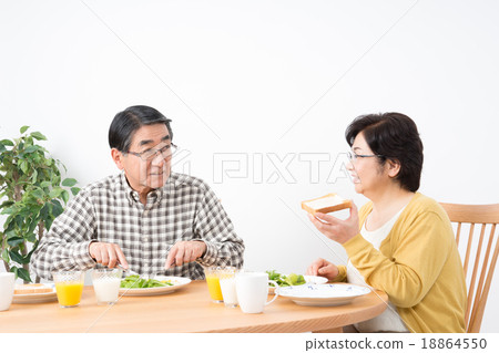 Stock Photo: husband and wife, western food, middle and old aged