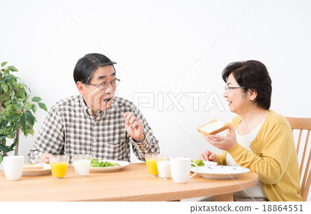 Stock Photo: husband and wife, western food, middle and old aged