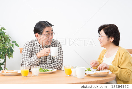 Stock Photo: husband and wife, western food, middle and old aged