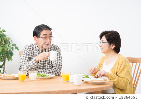 Stock Photo: husband and wife, western food, middle and old aged