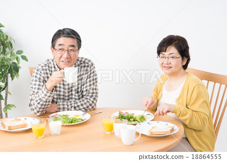 Stock Photo: husband and wife, western food, middle and old aged