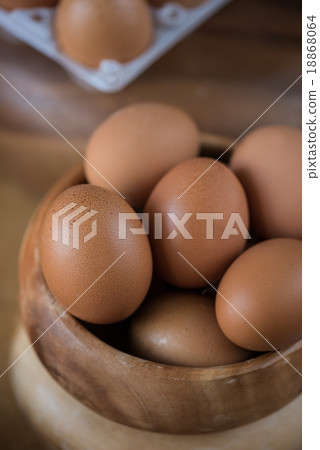 Fresh eggs at wooden plate Fresh eggs at wooden plate 18868064