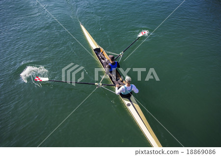 Two Men paddling 18869086