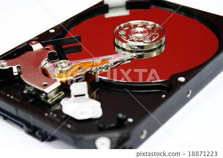 Close up inside of Harddisk on white background Close up inside of Harddisk on white background 18871223