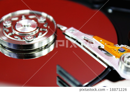 Close up inside of Harddisk on white background Close up inside of Harddisk on white background 18871226