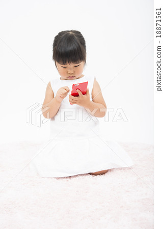 Girls using smartphones Girls using smartphones 18871561