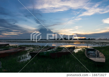 Boats moored in the creek evening Boats moored in the creek evening 18871827
