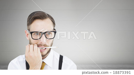 Composite image of geeky hipster biting on pencil Composite image of geeky hipster biting on pencil 18873391