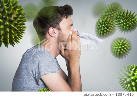 Composite image of close up side view of man blowing nose 18873410