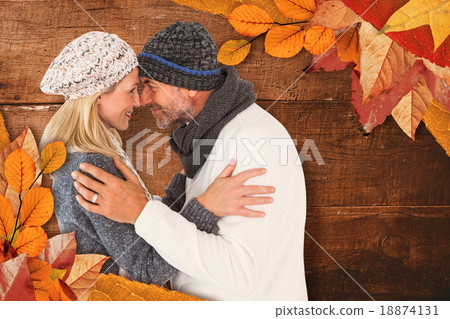 Composite image of smiling cute couple romancing over white back 18874131