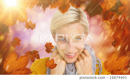 Composite image of smiling woman wearing a scarf Composite image of smiling woman wearing a scarf 18874401