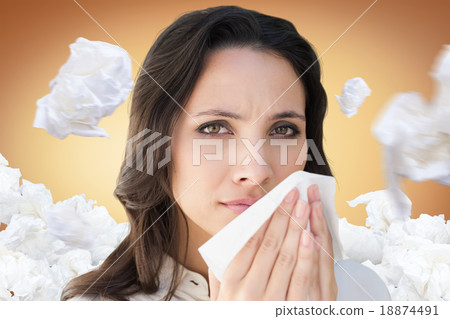 Composite image of brunette with a cold Composite image of brunette with a cold 18874491