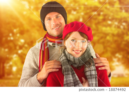 Composite image of couple smiling at the camera Composite image of couple smiling at the camera 18874492