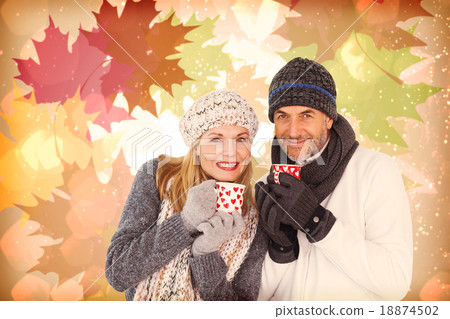 Composite image of portrait of couple drinking hot coffee 18874502