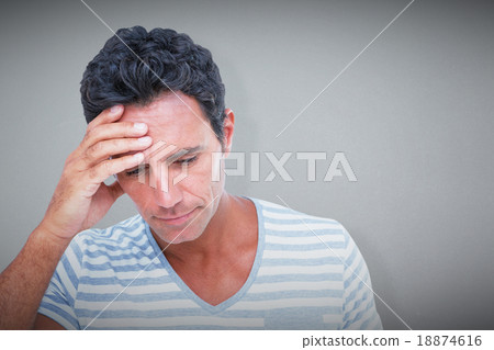 Composite image of upset man with hand on forehead Composite image of upset man with hand on forehead 18874616