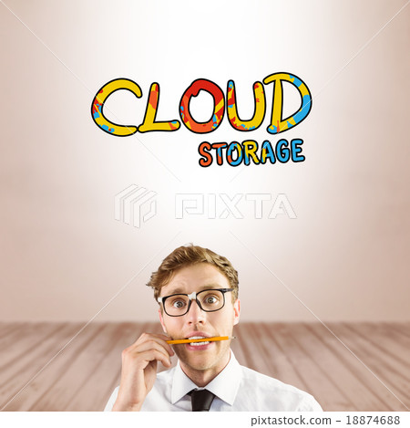 Composite image of geeky businessman biting a pencil 18874688