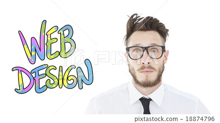 Composite image of geeky young businessman looking at camera 18874796