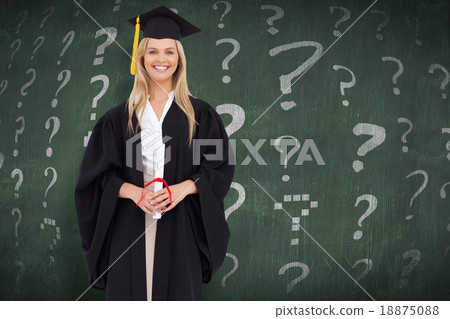 Composite image of smiling blonde student in graduate robe 18875088