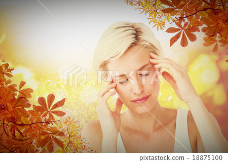 Composite image of pretty blonde with headache touching her temp Composite image of pretty blonde with headache touching her temp 18875100