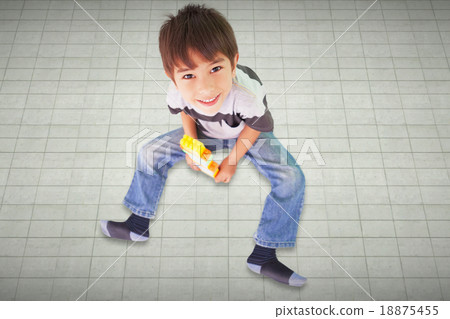 Composite image of cute boy sitting with building blocks Composite image of cute boy sitting with building blocks 18875455