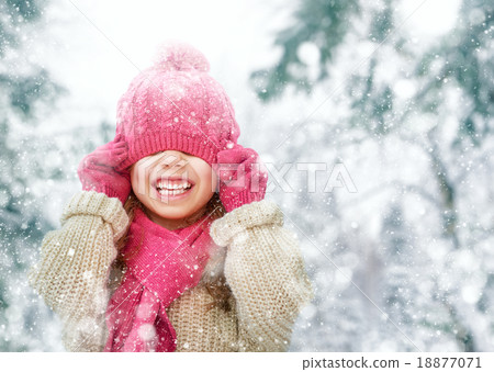 girl playing on a winter walk 18877071