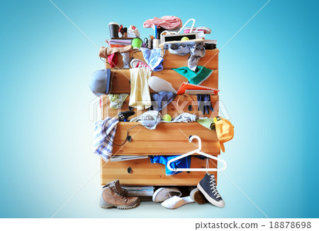 Mess, dresser with scattered clothes 18878698