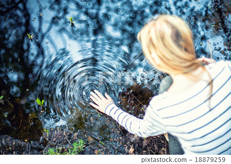 Girl near the water 18879259
