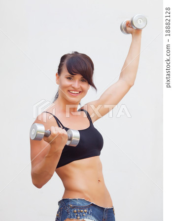 Girl with dumbell Girl with dumbell 18882128