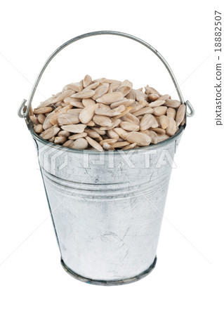 Bucket with sunflower seeds Bucket with sunflower seeds 18882507