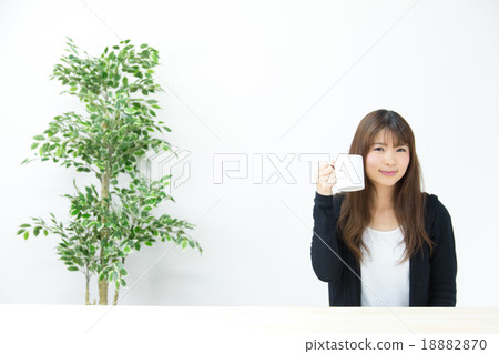 A woman drinking hot drinks A woman drinking hot drinks 18882870