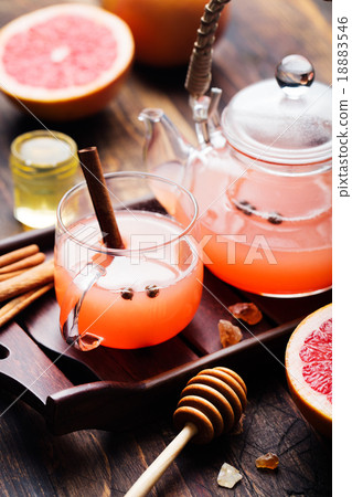 Grapefruit herbal tea with spices and honey Grapefruit herbal tea with spices and honey 18883546