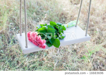Flowers on a swing Flowers on a swing 18883696