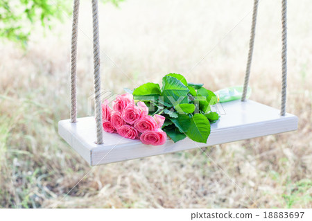 Flowers on a swing Flowers on a swing 18883697