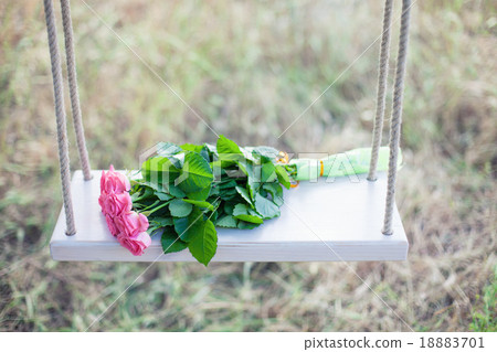 Flowers on a swing Flowers on a swing 18883701